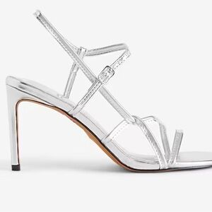 NWT. Express silver strappy sandals in size 8.